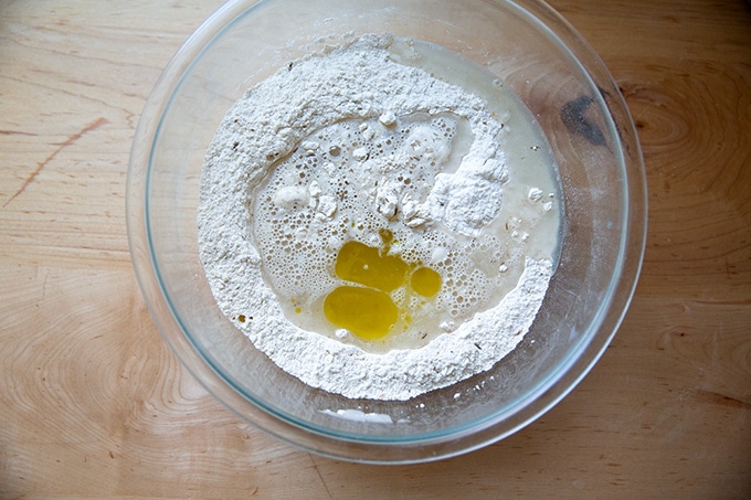 A bowl of rye bread dough ingredients, ready to be mixed.