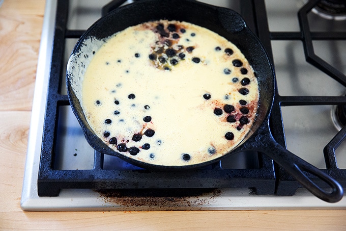A blueberry Dutch baby, ready for the oven.