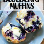 A halved blueberry muffin spread with butter.