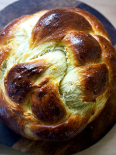 Freshly baked Challah on a board.