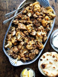 A platter of sheet pan chicken and cauliflower shawarma.