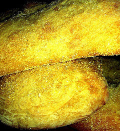 Ciabatta has a crisp crust, a soft porous interior and is light to the touch. The thin crusty exterior forms an ideal base to house heartier fillings such as roast beef, ham or grilled chicken breasts; and its soft interior absorbs spreads and sauces, without getting soggy—ciabatta holds up nicely under pulled pork, chicken parmesan and even hamburgers. // alexandracooks.com