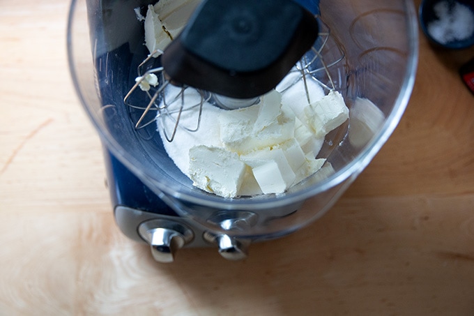 Cream cheese and sugar in a stand mixer.