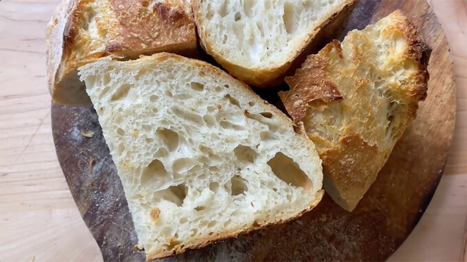 Sliced sourdough bread on a board. 