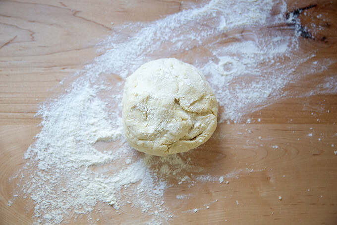 Sourdough flour tortilla dough on a floured work surface.