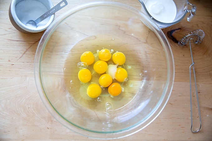A bowl of 9 eggs and 1 teaspoon salt.