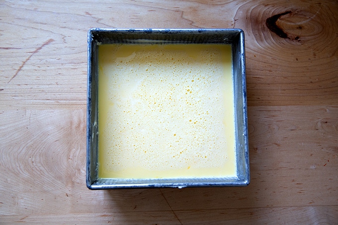 Just-baked egg custard in a pan.