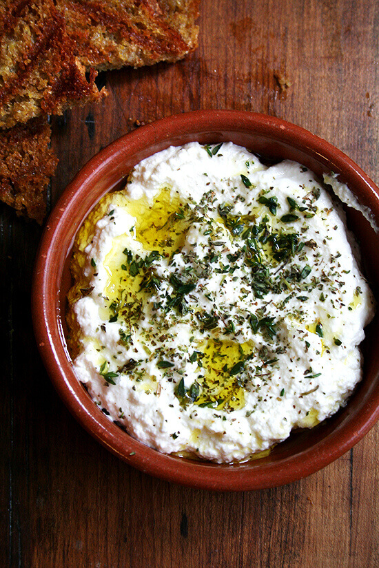 homemade ricotta with herbs and olive oil