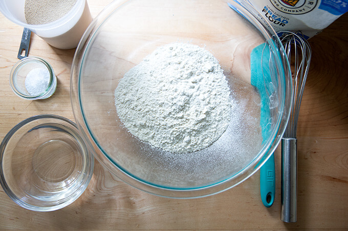 An overhead shot of the ingredients to make yeast-leavened Detroit-style pizza dough.