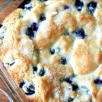 Lemon-blueberry buttermilk breakfast cake just baked in a glass pan.