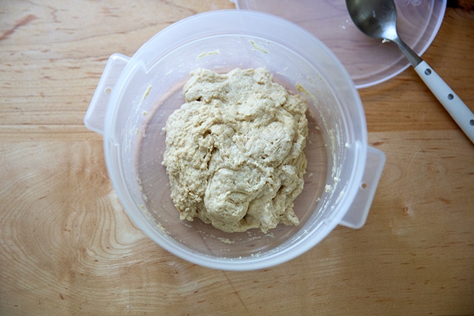 A 2-quart container holding just-mixed flour and pineapple juice.
