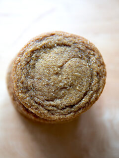 An overhead view of a stack of gingersnap cookies.