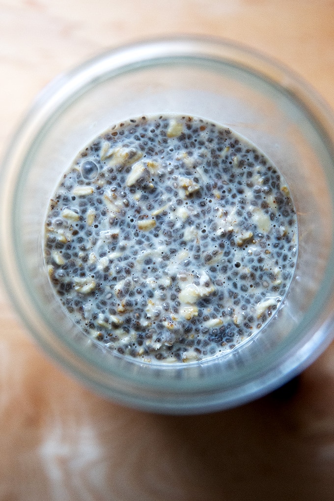An overhead shot of a Weck jar filled with overnight chia oats, ready to eat.