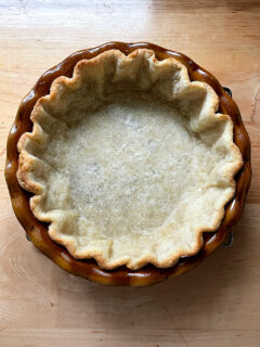 A parbaked pie crust.