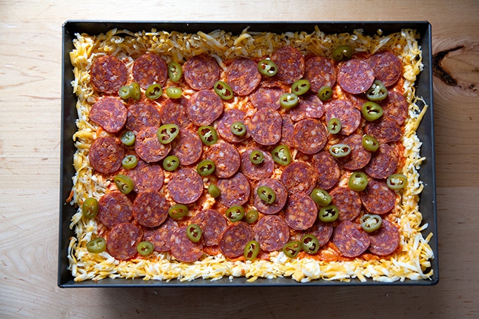 A Detroit style pizza ready for the oven.