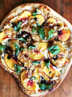 A nectarine pizza cut into slices.