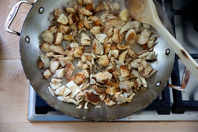 Sautéed mushrooms in a skillet.