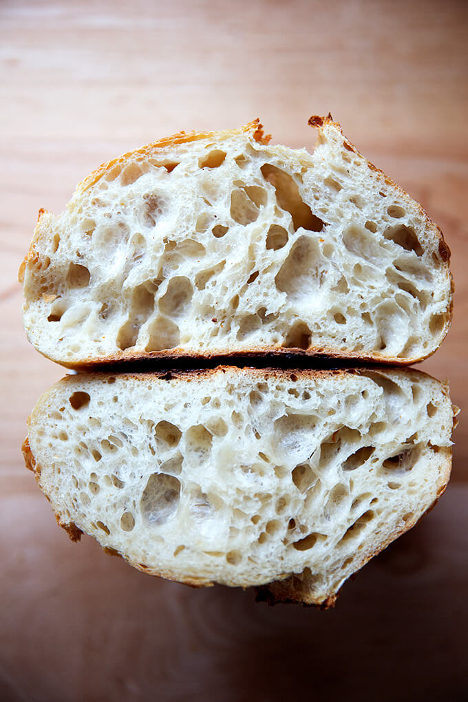 A halved loaf of sourdough bread.