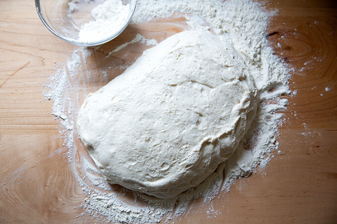 A blob of sourdough ciabatta dough on the countertop.