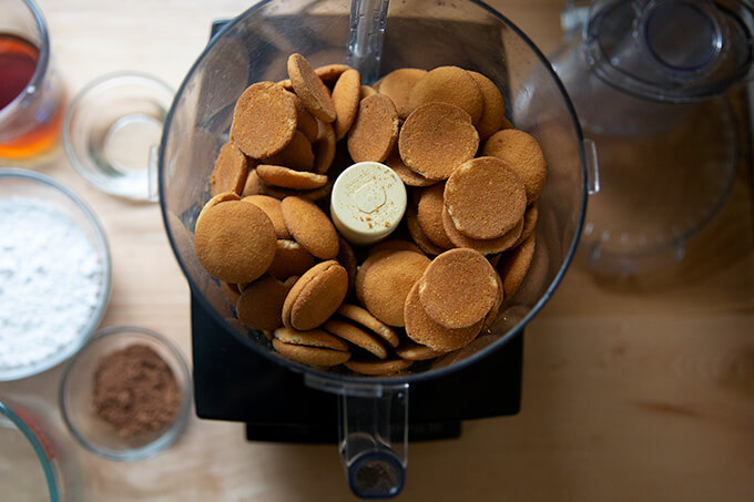 Vanilla wafers for rum balls in a food processor.